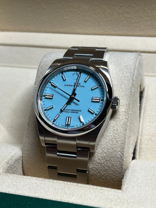 Silver watch with blue dial in a box
